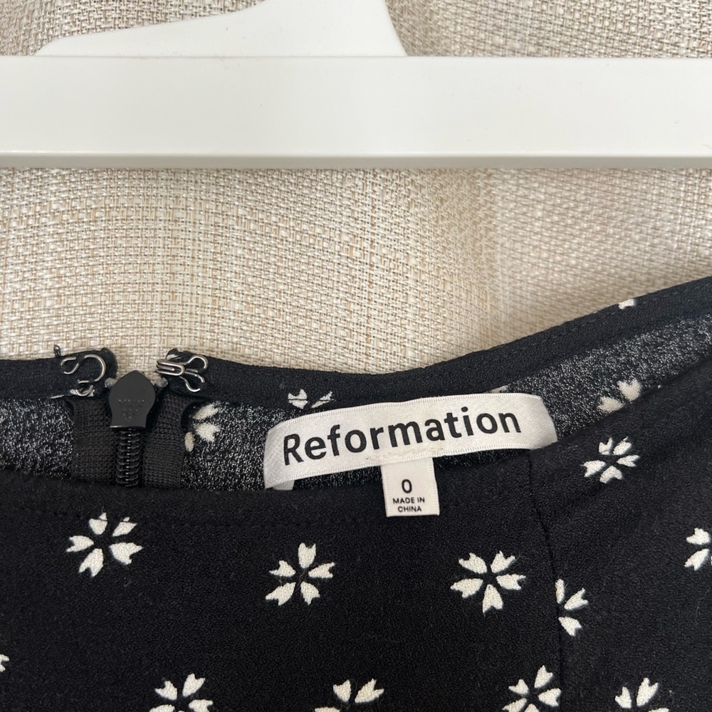 Reformation Black maxi skirt with White Floral Design